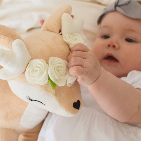 Plush Deer with cream flower wreath
