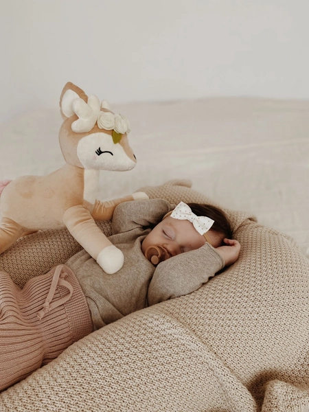 Plush Deer with cream flower wreath