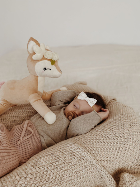 Plush Deer with cream flower wreath