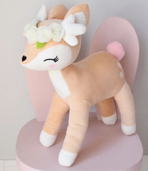 Plush Deer with cream flower wreath