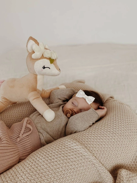 Plush Deer with cream flower wreath