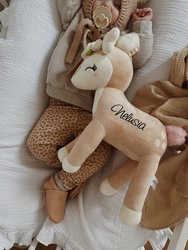 Plush Deer with cream flower wreath