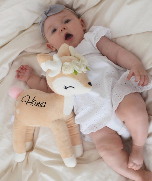 Plush Deer with cream flower wreath