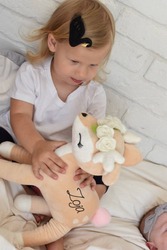 Plush Deer with cream flower wreath