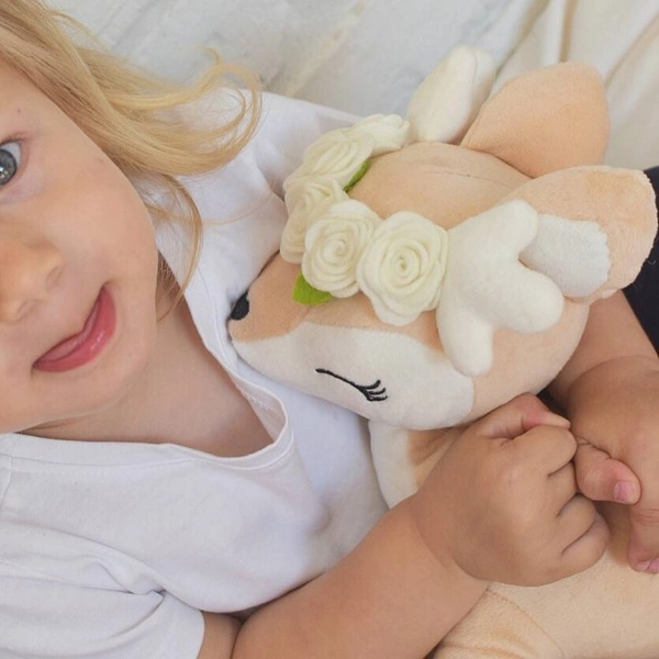 Plush Deer with cream flower wreath